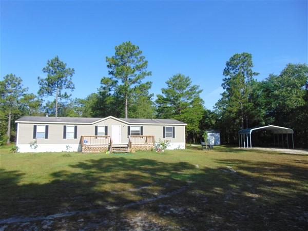 1051 Hinote Road DeFuniak Springs, FL 32433 - Photo 26 of 39 a house view with a outdoor space