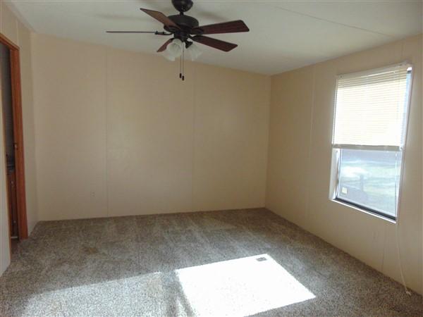 1051 Hinote Road DeFuniak Springs, FL 32433 - Photo 8 of 39 a view of room with window and a ceiling fan