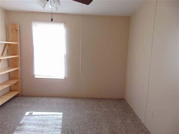 1051 Hinote Road DeFuniak Springs, FL 32433 - Photo 10 of 39 a view of an empty room with a window