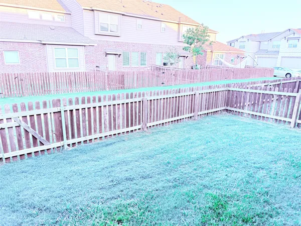 a view of a backyard with a garden
