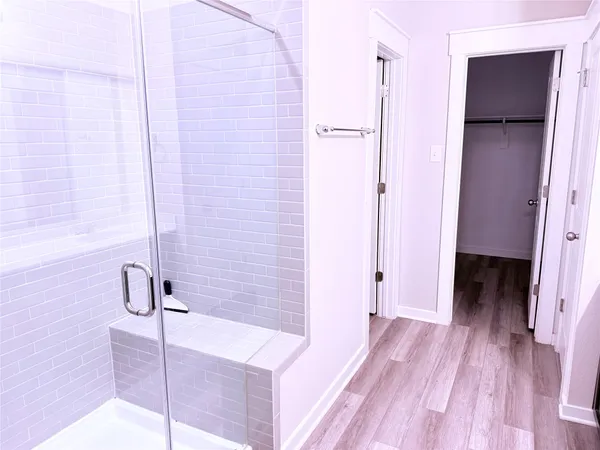 a bathroom with a sink and a shower