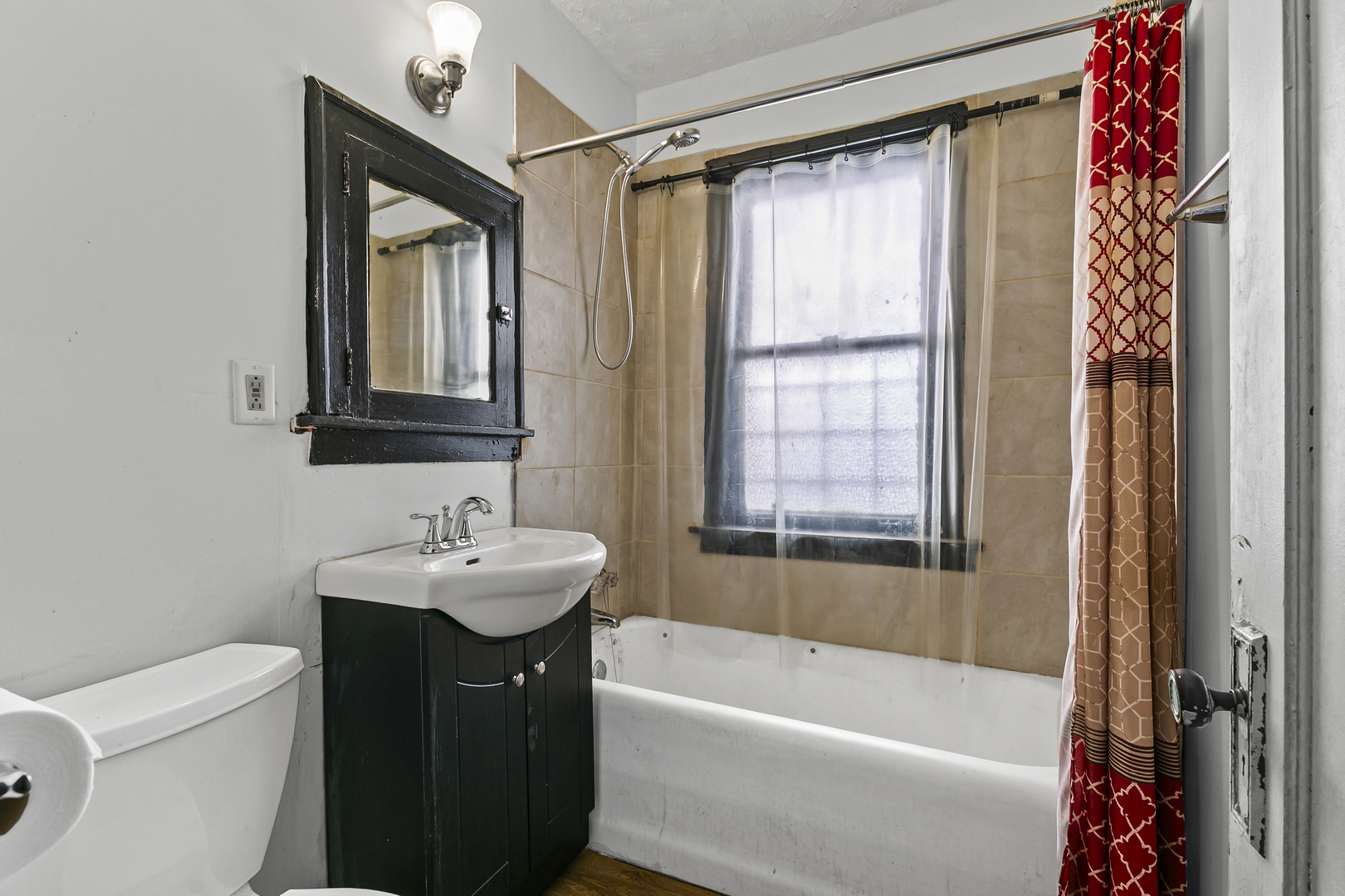 6536 South Rhodes Avenue Chicago, IL 60637 - Photo 14 of 21 a bathroom with a sink toilet and shower