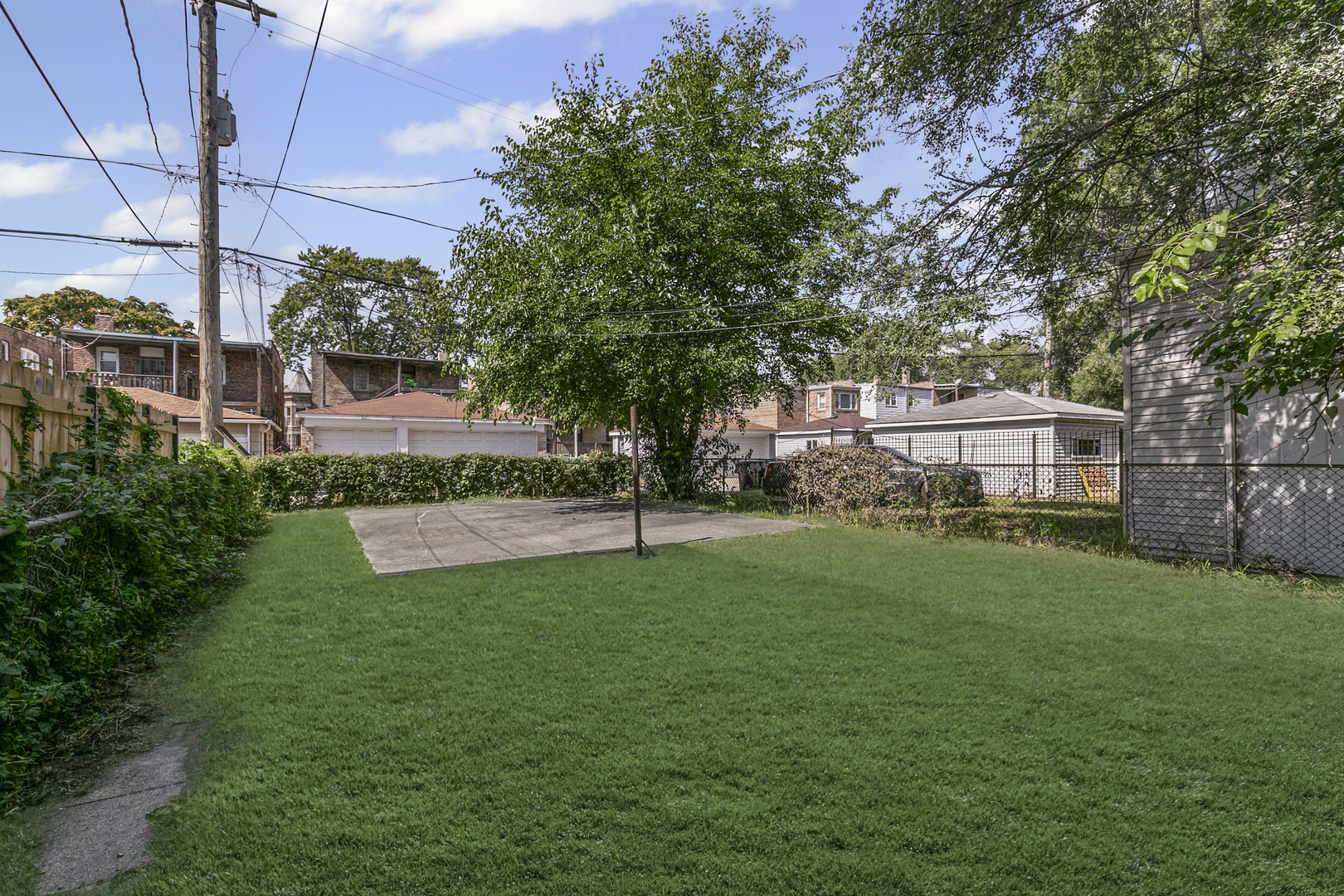 6536 South Rhodes Avenue Chicago, IL 60637 - Photo 20 of 21 a view of a house with backyard and sitting area