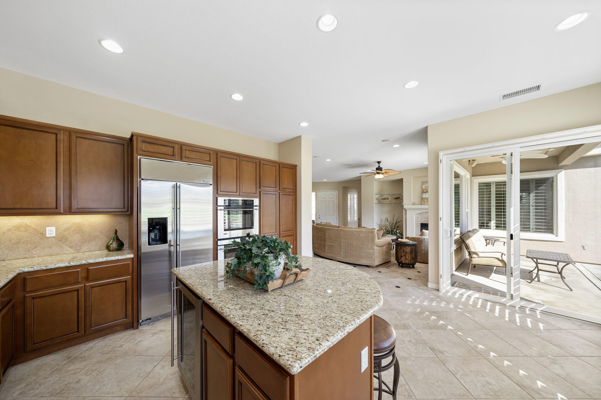 81189 Red Rock Road La Quinta, CA 92253 - Photo 13 of 85 a kitchen with counter top space cabinets and stainless steel appliances