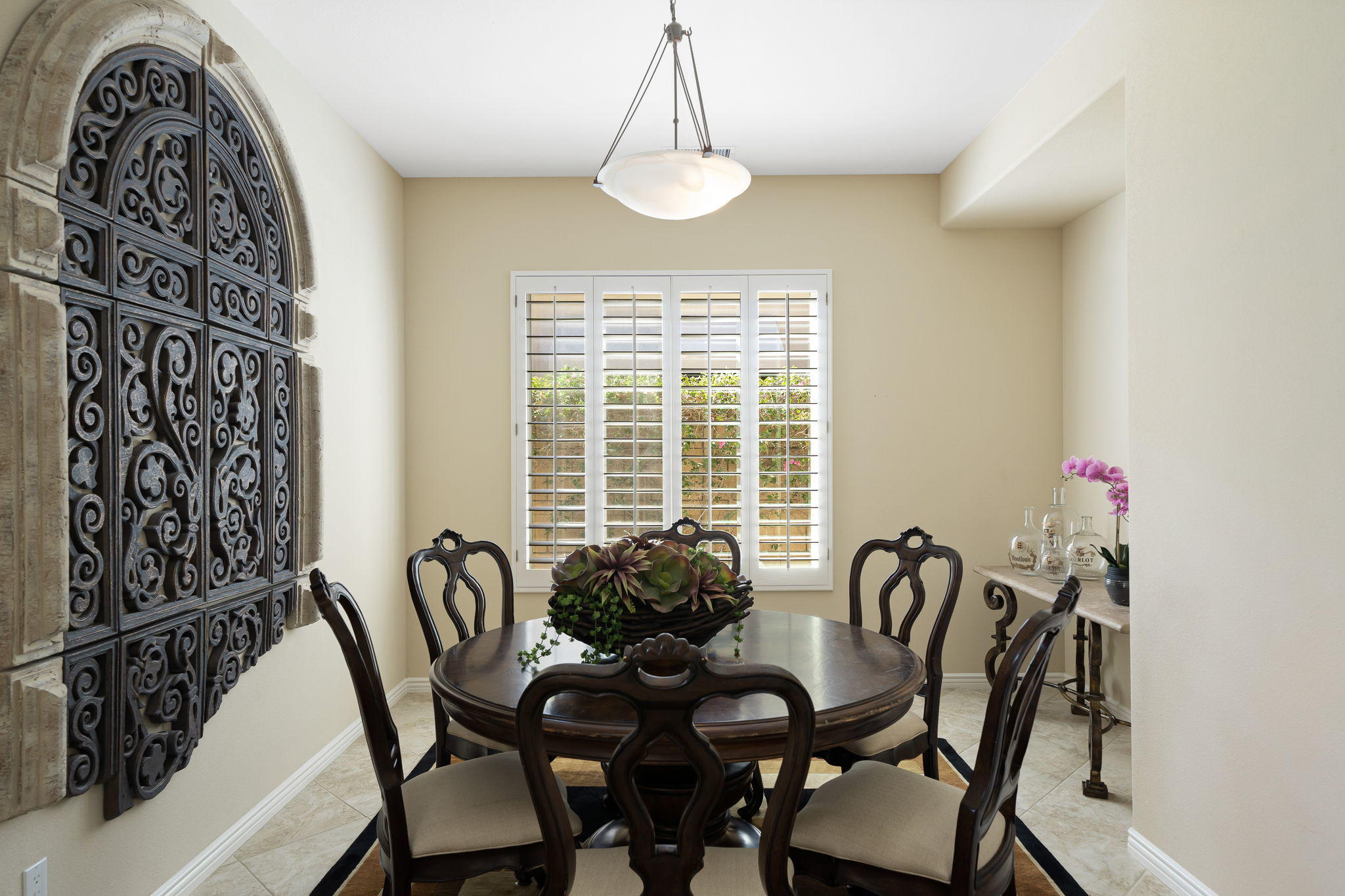 81189 Red Rock Road La Quinta, CA 92253 - Photo 16 of 85 a view of a dining room with furniture and window