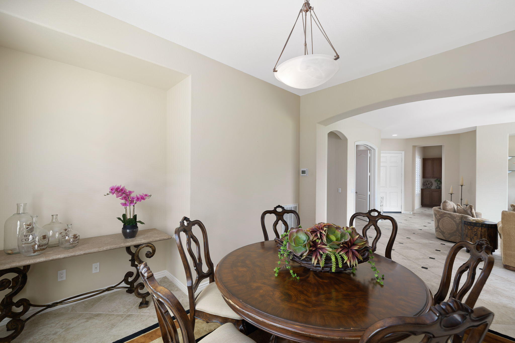 81189 Red Rock Road La Quinta, CA 92253 - Photo 17 of 85 a view of a dining room with furniture