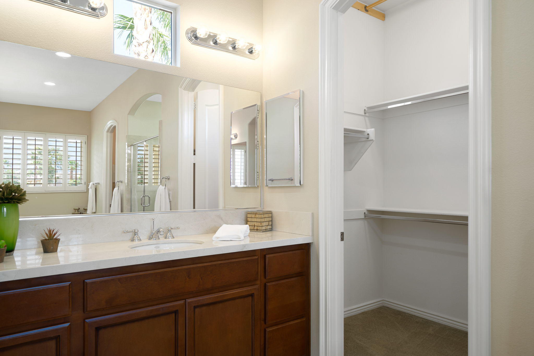 81189 Red Rock Road La Quinta, CA 92253 - Photo 24 of 85 a bathroom with a sink and a mirror