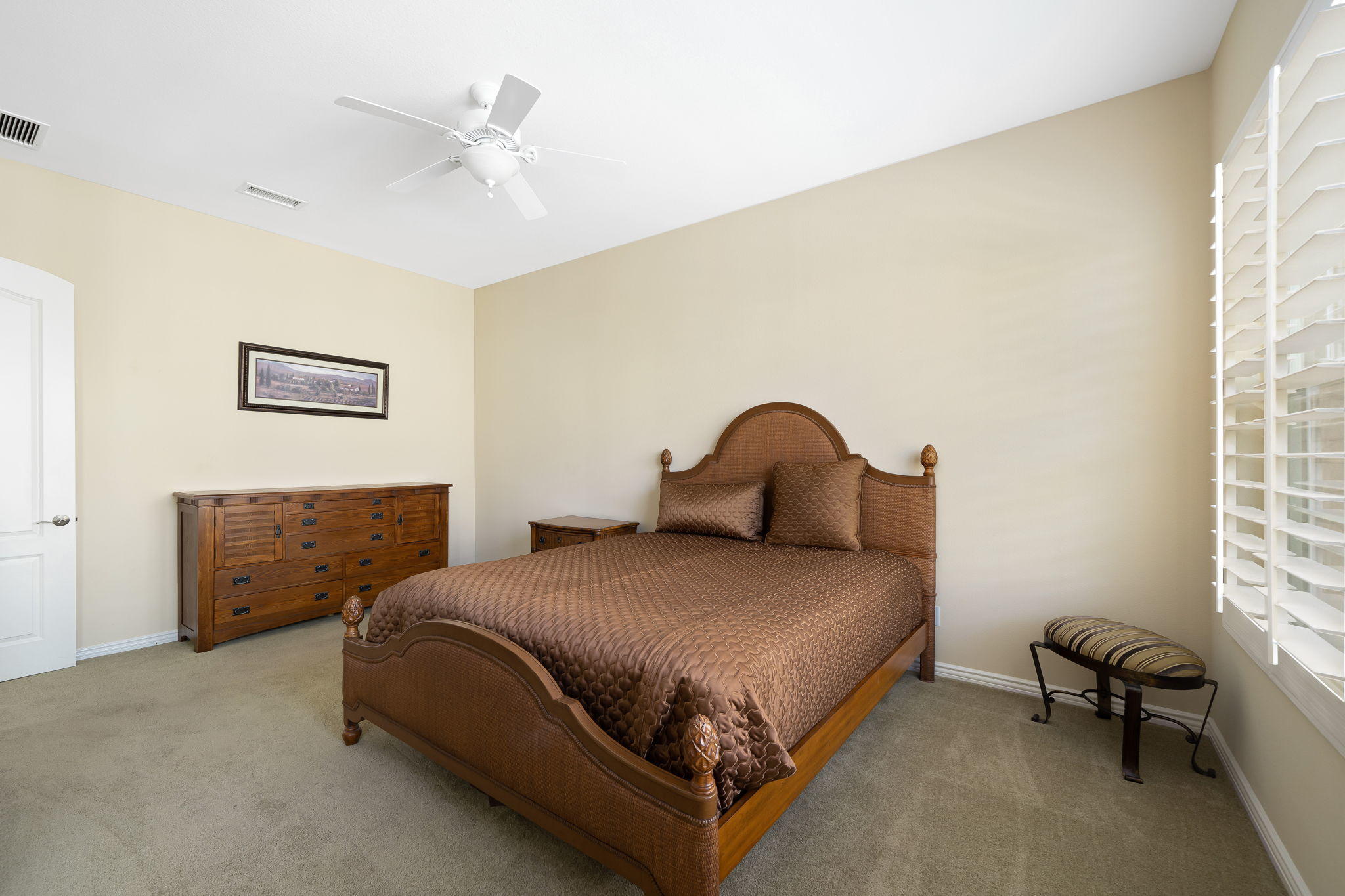81189 Red Rock Road La Quinta, CA 92253 - Photo 26 of 85 a bedroom with a bed and a window