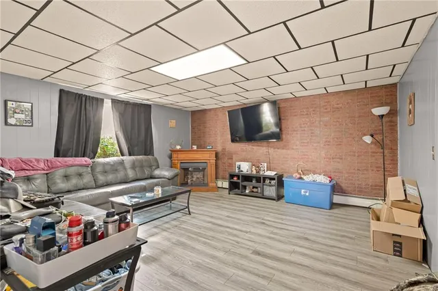 a work room with furniture and wooden floor