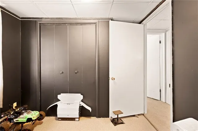 a bed room with a bed and window