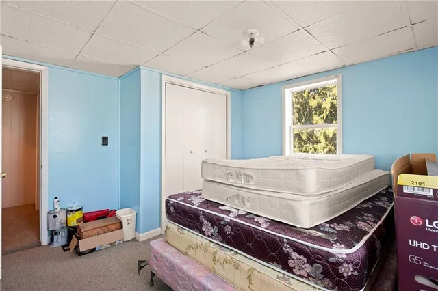 a view of deck with two chairs and wooden floor