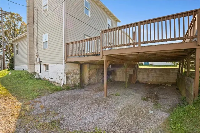 a view of a house with basketball court