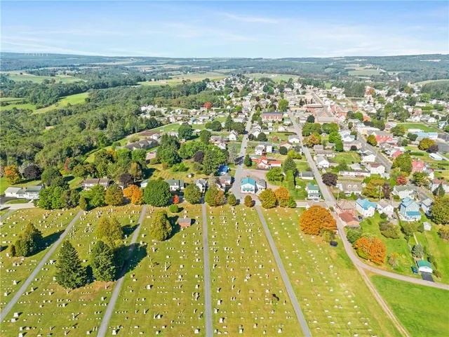 a view of a city with an ocean view