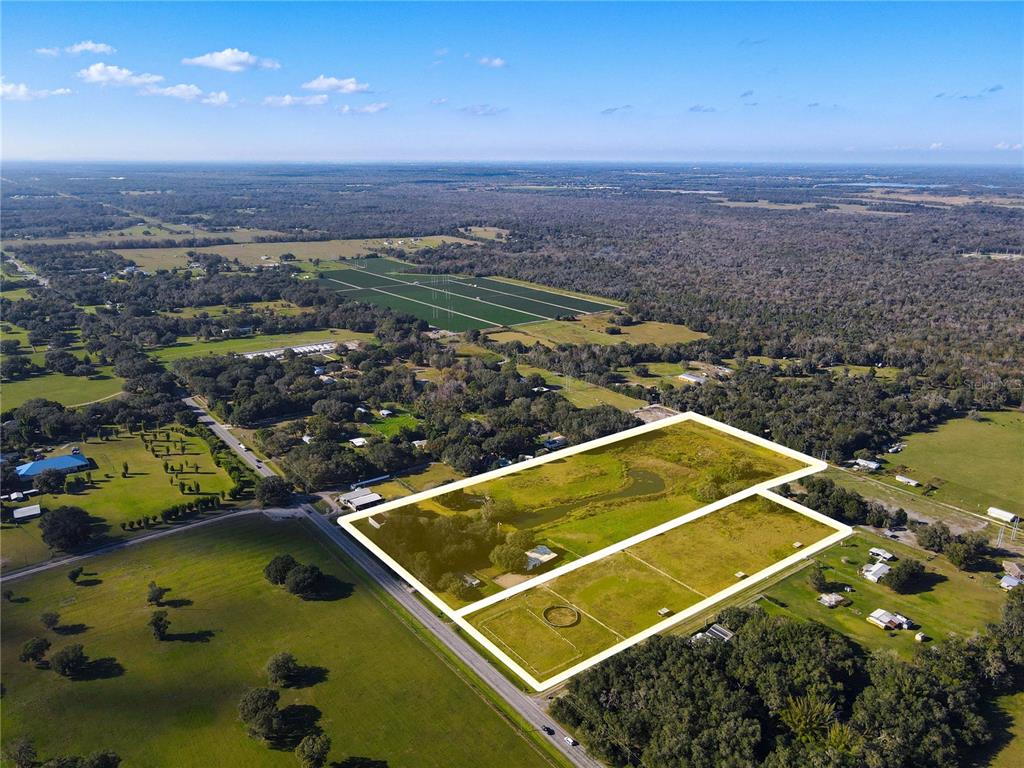 8719 Lithia Pinecrest Road Lithia, FL 33547 - Photo 2 of 21 a view of a tennis court