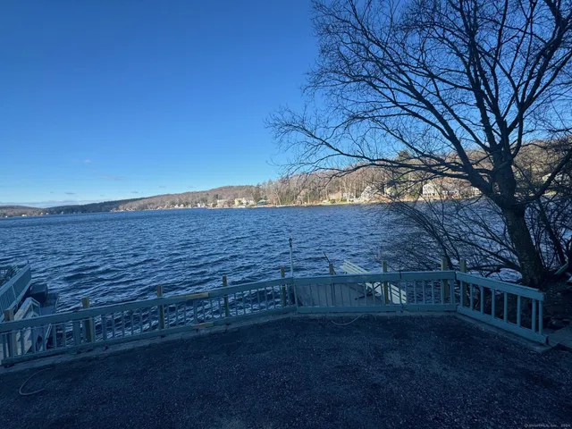 a view of a backyard of the house