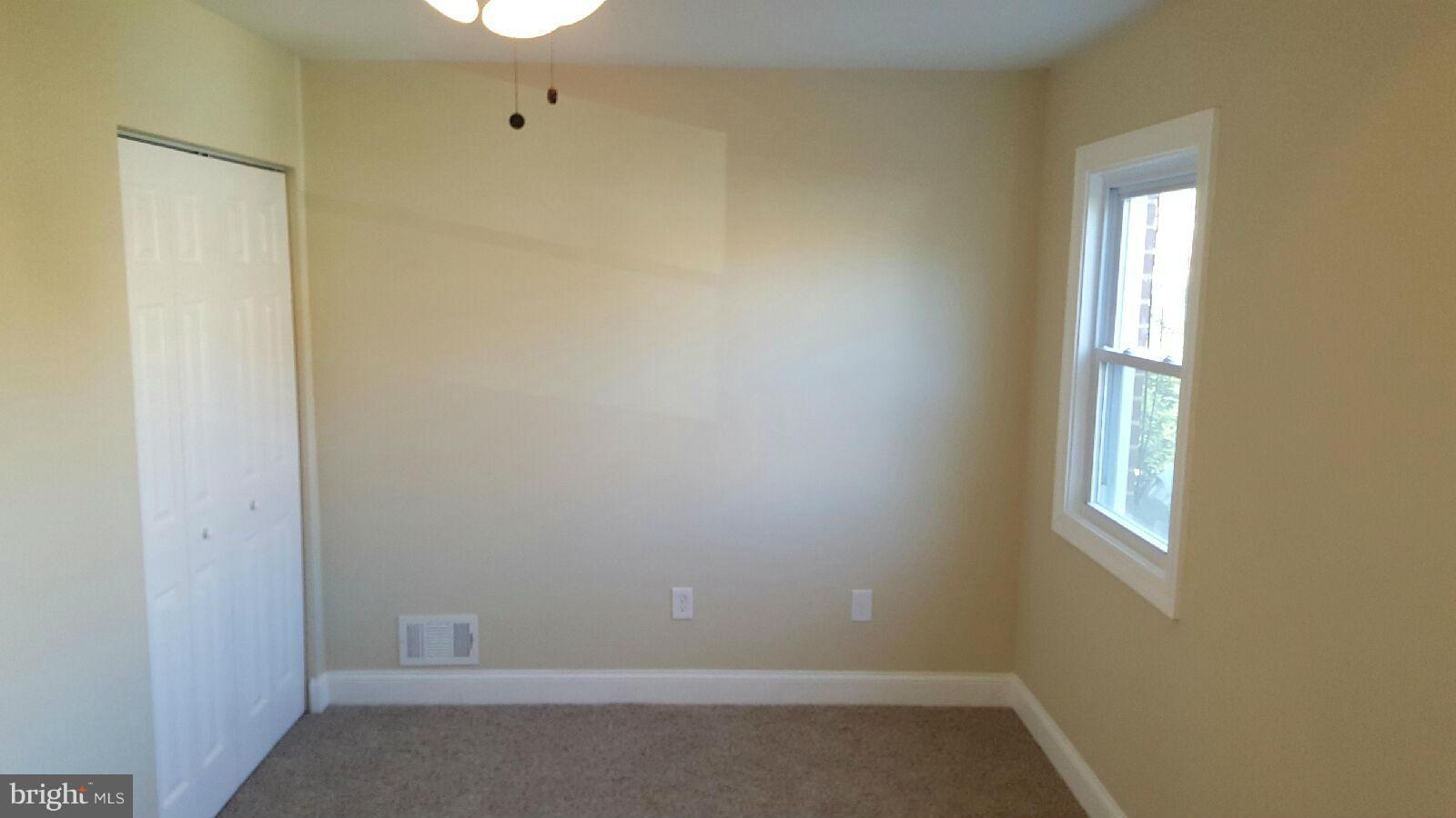 8030 Gray Haven Road Baltimore, MD 21222 - Photo 22 of 30 a room that has a window in it
