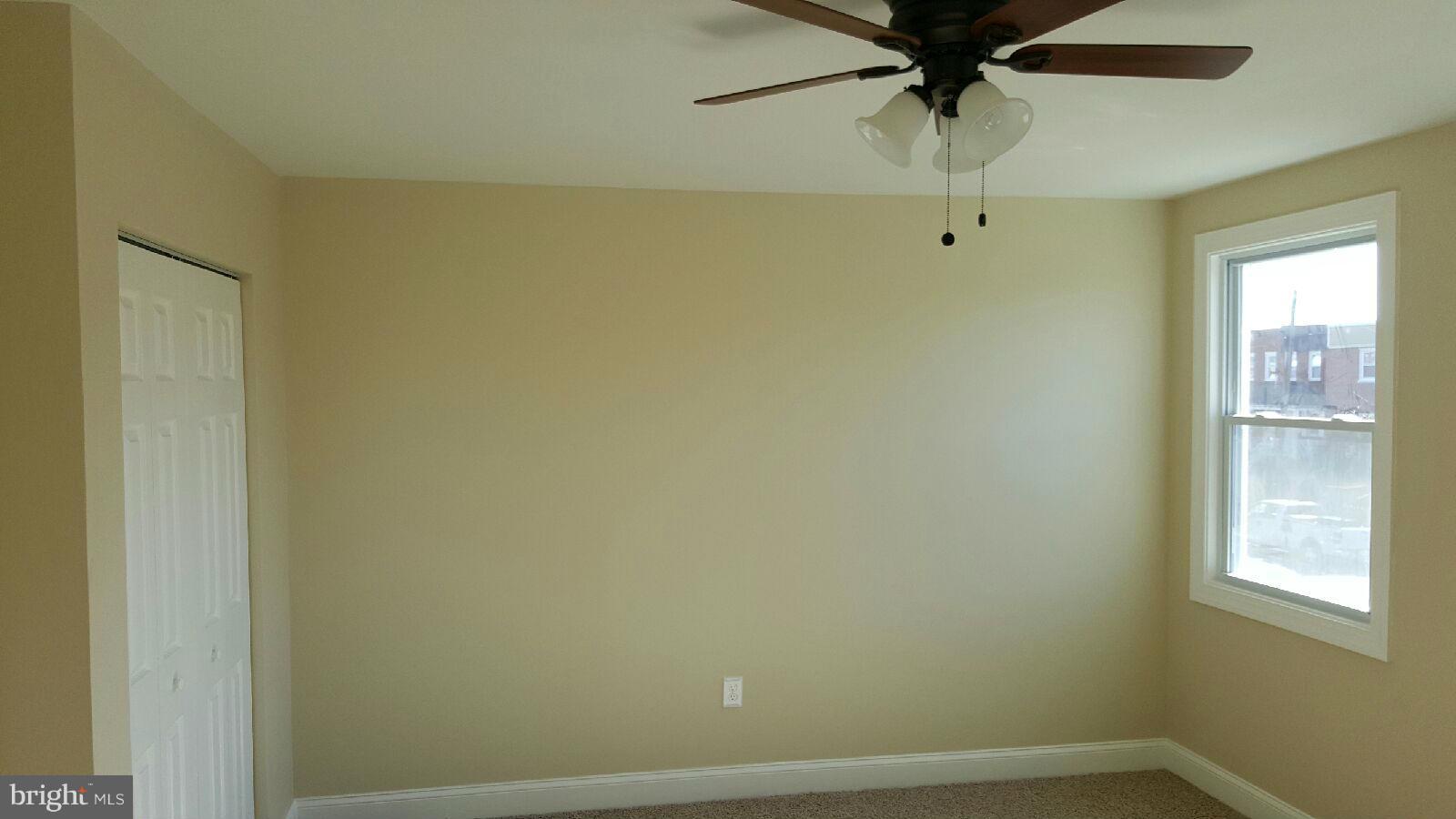8030 Gray Haven Road Baltimore, MD 21222 - Photo 23 of 30 a view of a small space with wooden floor and a window