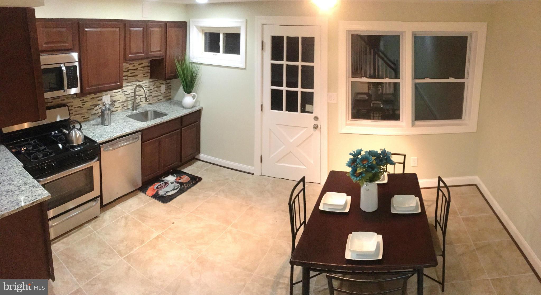 8030 Gray Haven Road Baltimore, MD 21222 - Photo 7 of 30 a view of a kitchen area