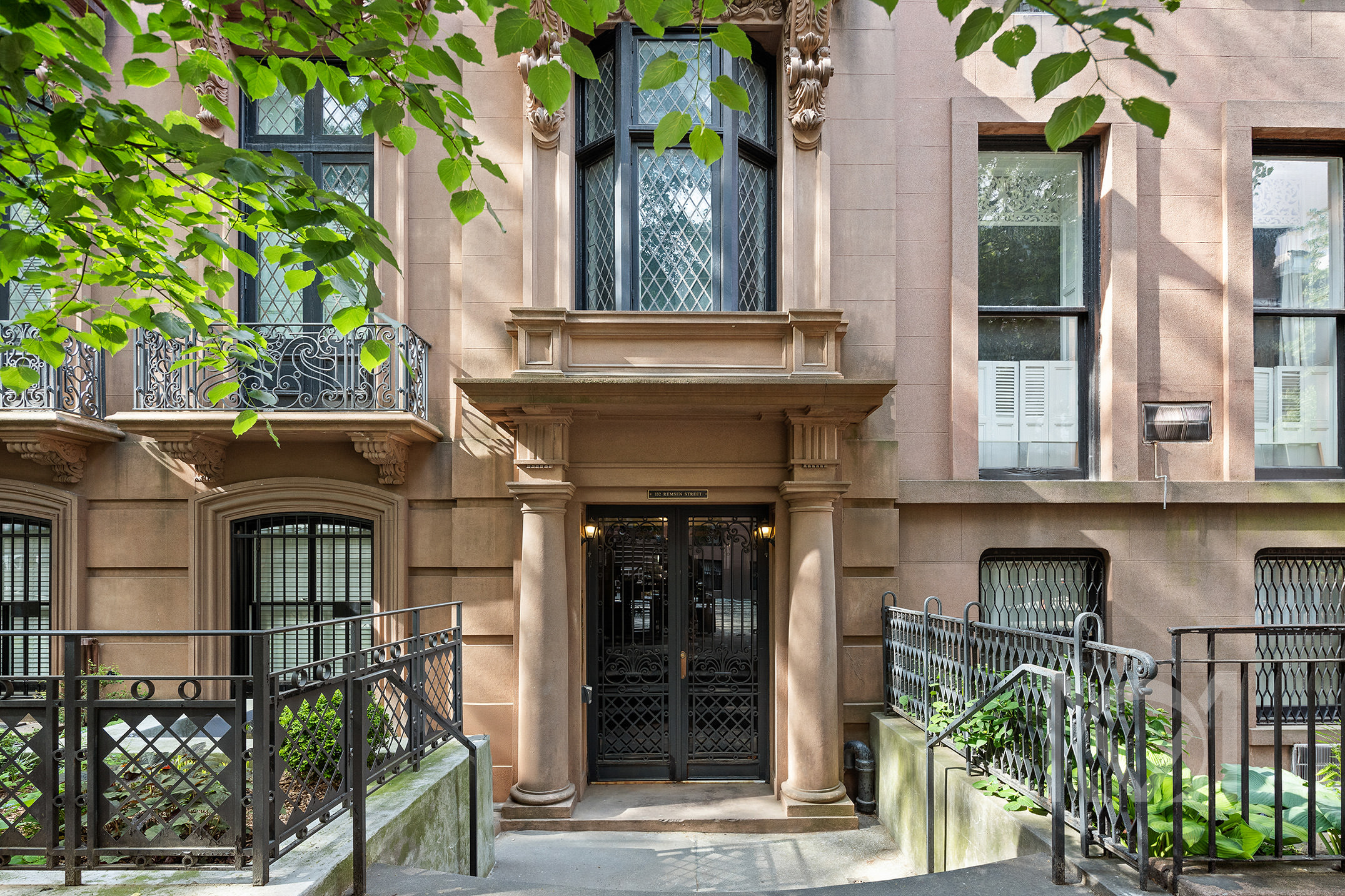 132 Remsen Street, Unit 12 Brooklyn, NY 11201 - Photo 7 of 8 a front view of a house with a plants