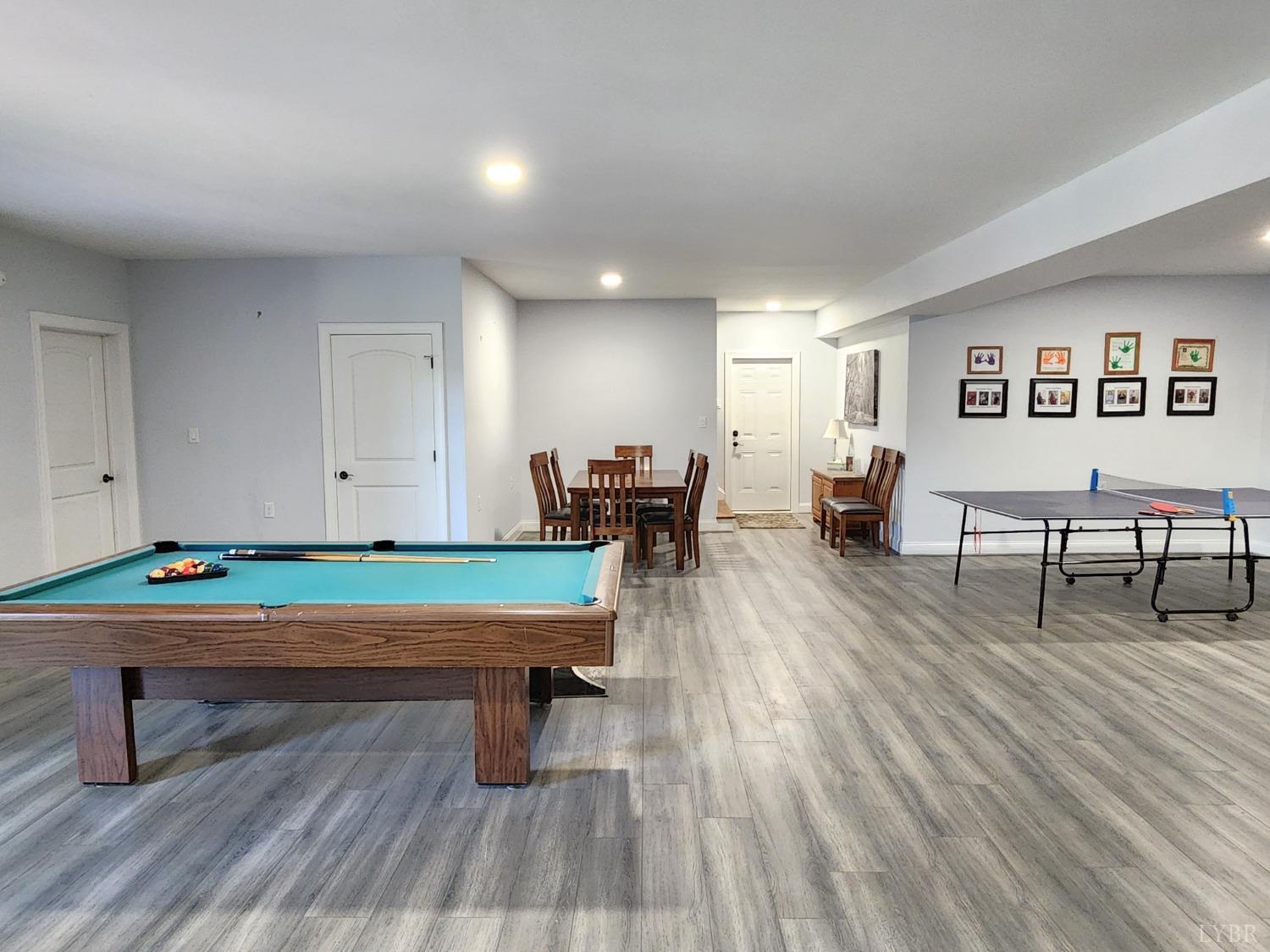 623 Two Bid Road Evington, VA 24550 - Photo 66 of 97 a room with furniture pool table and wooden floor