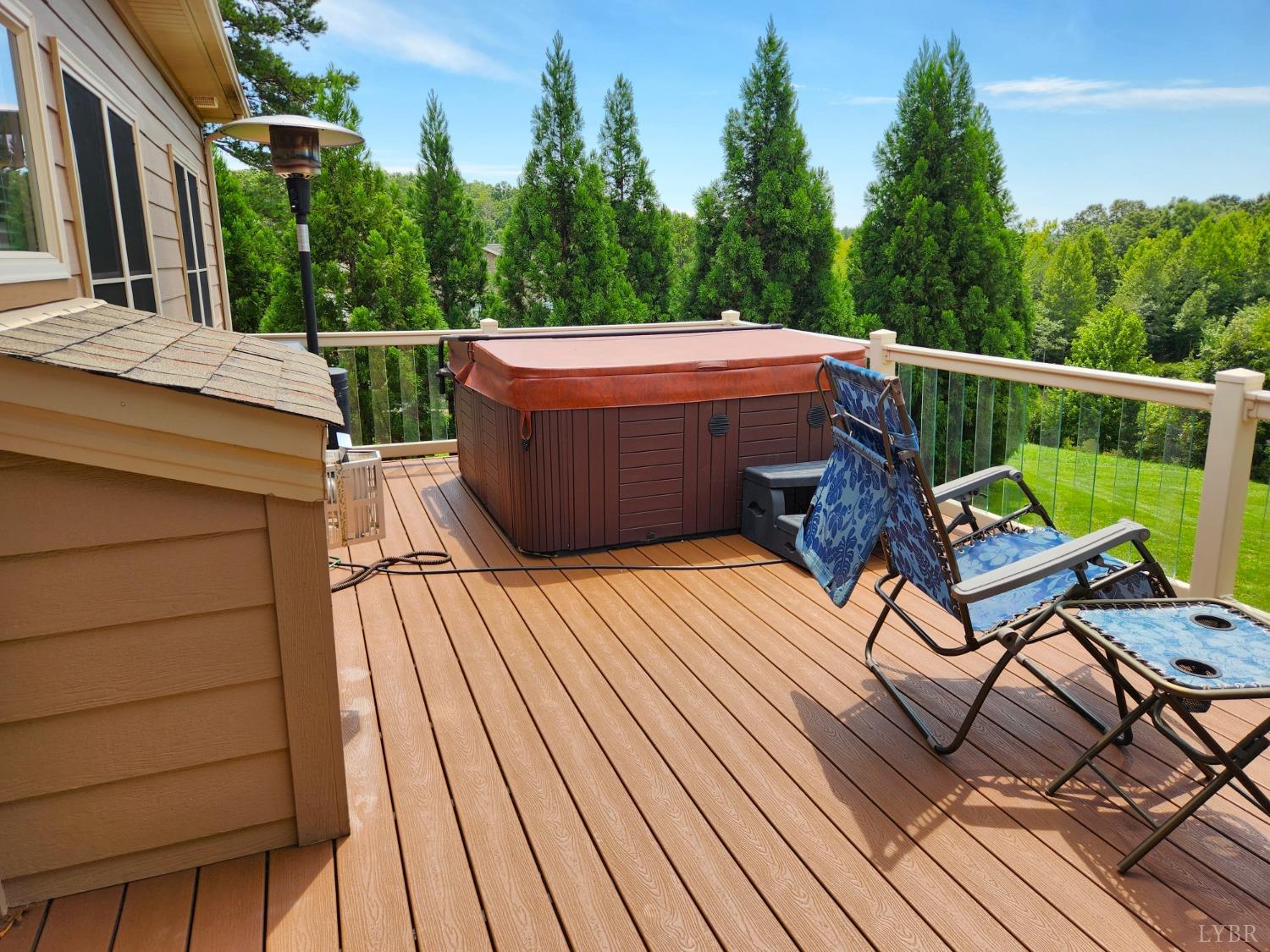 623 Two Bid Road Evington, VA 24550 - Photo 84 of 97 a view of a roof deck with wooden floor and seating space