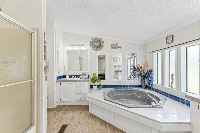a kitchen with lots of counter top space and stainless steel appliances