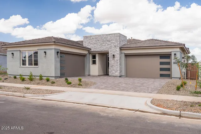 a view of a house with a street