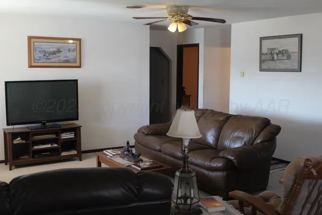 a kitchen with a cabinets and wooden floor