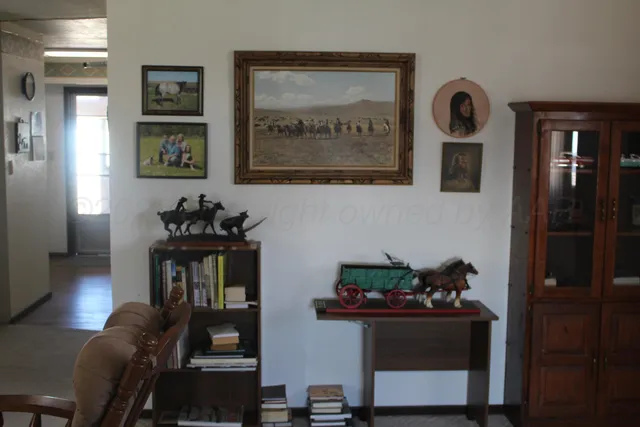 a bedroom with bed and a window