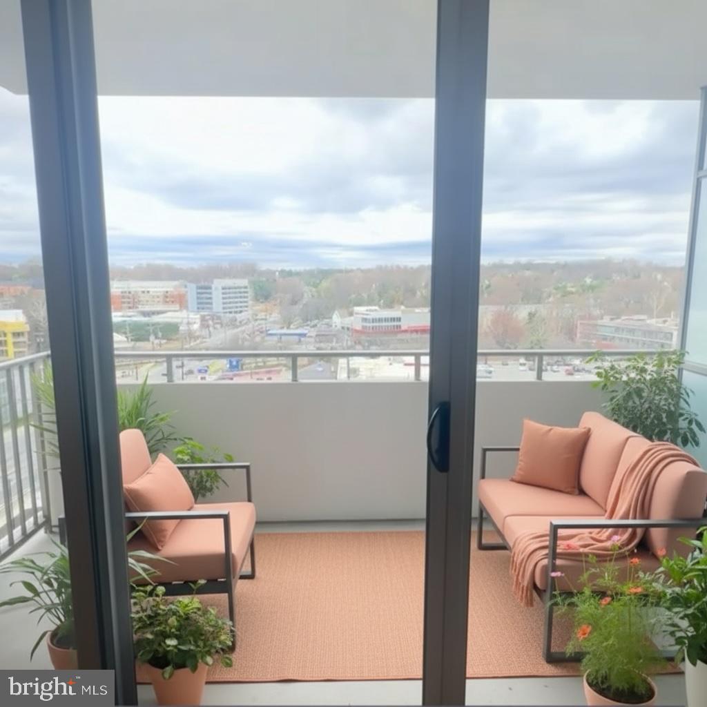 5101 River Road, Unit 1103 Bethesda, MD 20816 - Photo 11 of 22 a balcony with furniture and a bench