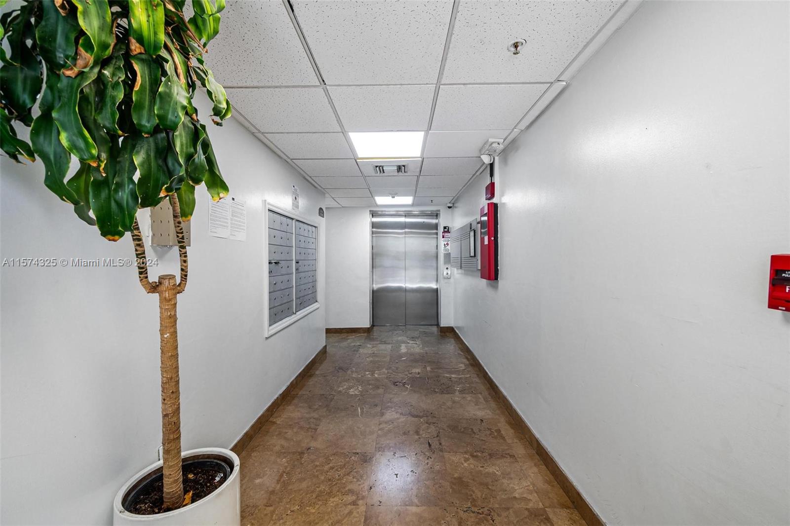 102 Southwest 6th Avenue, Unit 401 Miami, FL 33130 - Photo 27 of 27 a view of a hallway with entryway