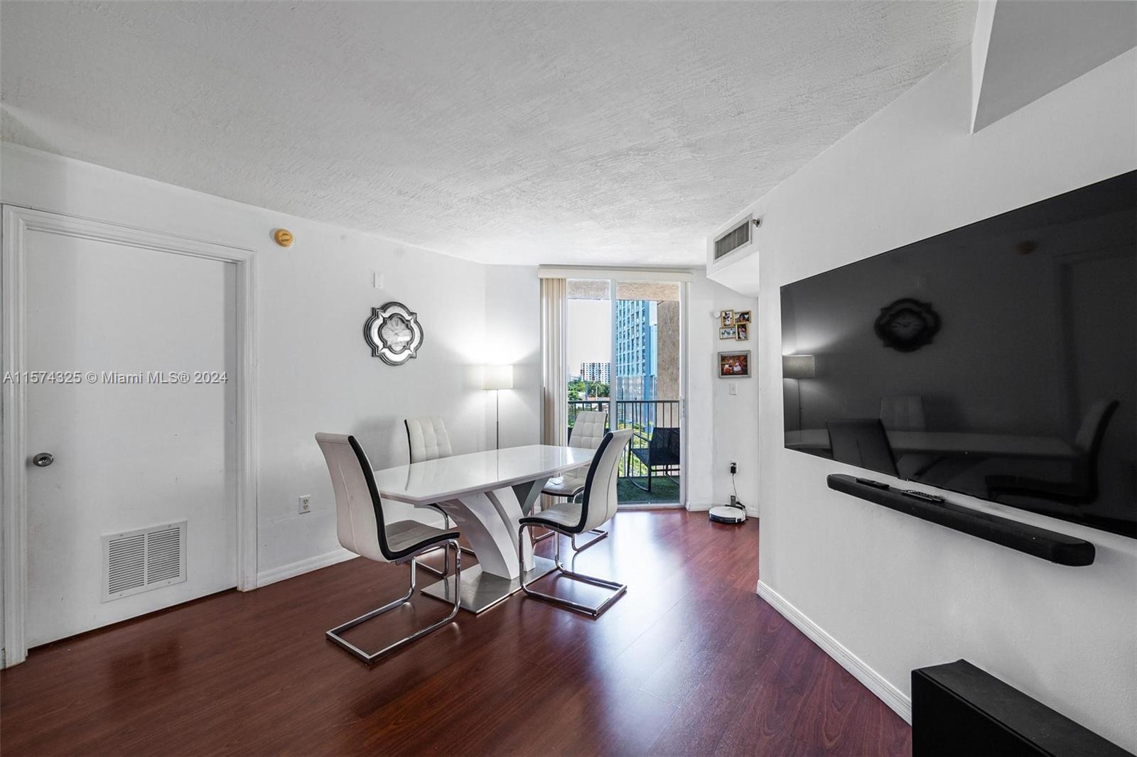 102 Southwest 6th Avenue, Unit 401 Miami, FL 33130 - Photo 8 of 27 a view of a workspace with furniture and a window
