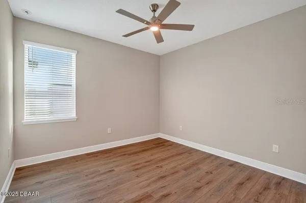an aerial view of a city with lawn chairs