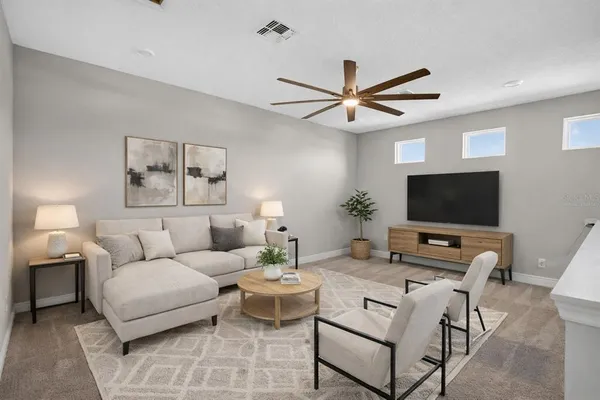 an aerial view of a house with a lake view