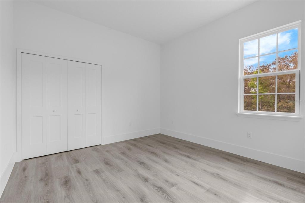 3172 Southwest 137th Loop Ocala, FL 34473 - Photo 14 of 38 an empty room with a window