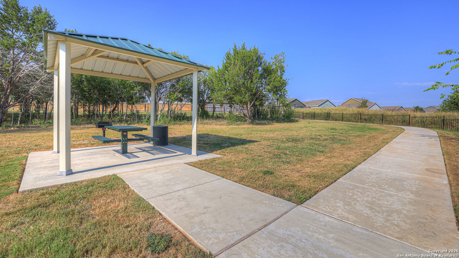 323 Low Pasture Trail Maxwell, TX 78656 - Photo 38 of 40 a view of a swimming pool with a patio and a yard