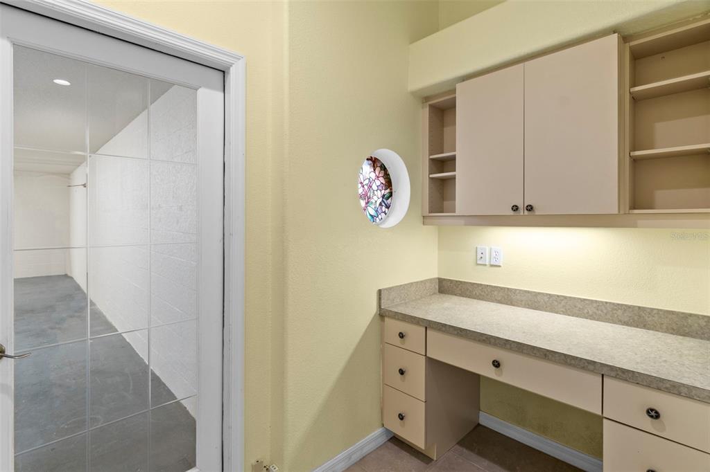 10130 Lazy Days Court Weeki Wachee, FL 34613 - Photo 58 of 85 a view of a storage and utility room with closet