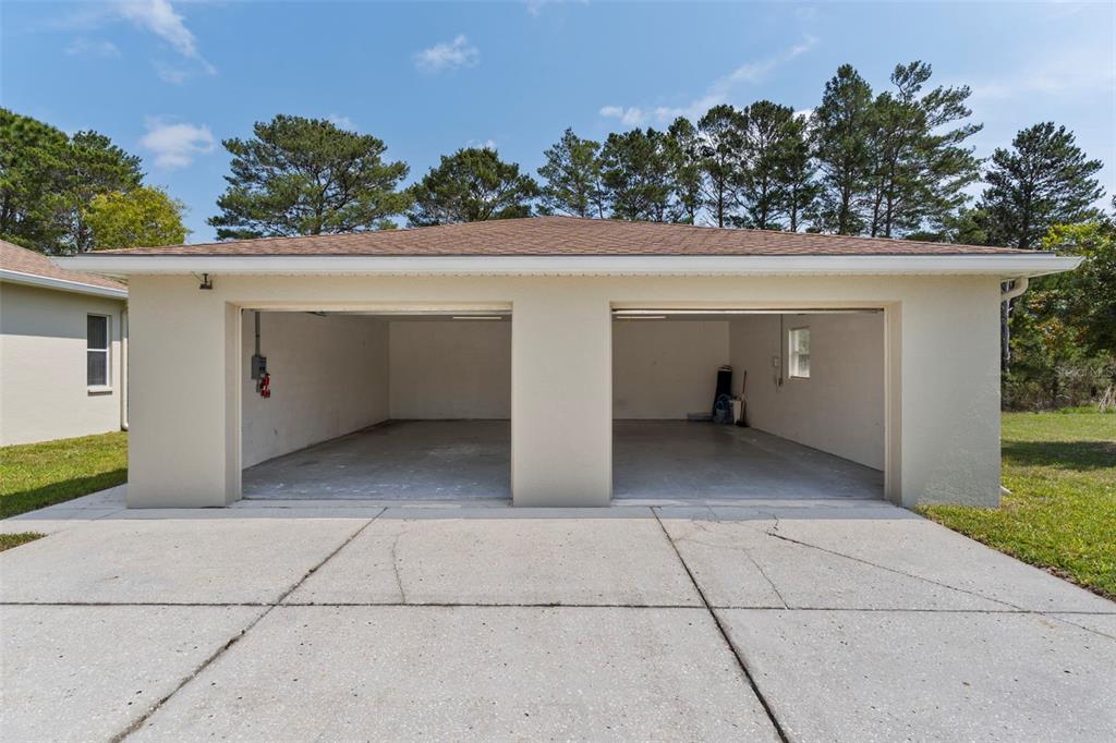 10130 Lazy Days Court Weeki Wachee, FL 34613 - Photo 71 of 85 front view of a house with a yard