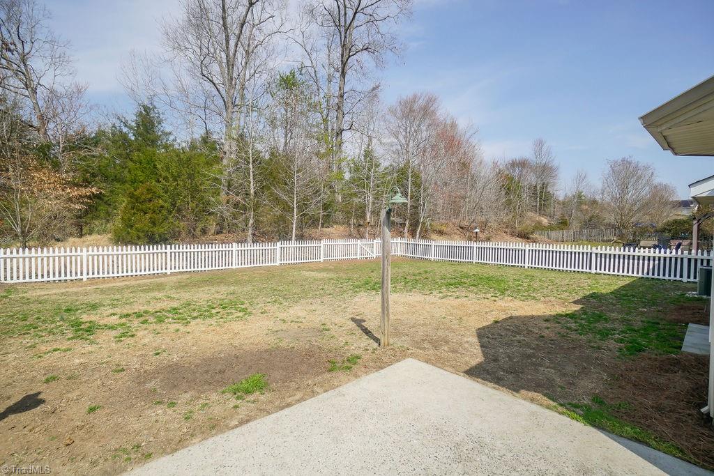 1128 Wesson Court High Point, NC 27265 - Photo 13 of 15 Plenty of space to play or garden in the fenced in yard.