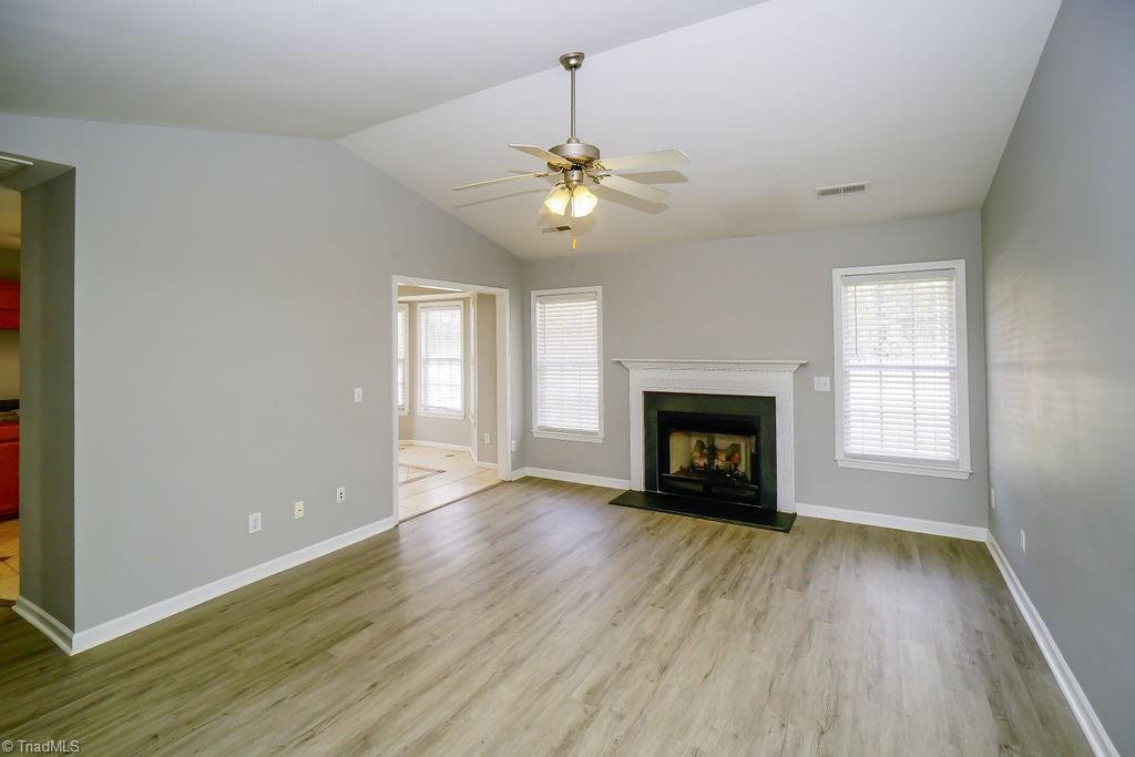 1128 Wesson Court High Point, NC 27265 - Photo 2 of 15 Living room with gas log fireplace