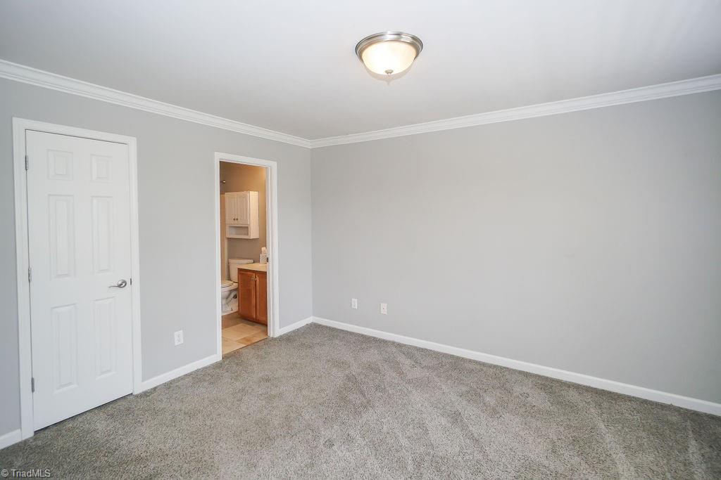 1128 Wesson Court High Point, NC 27265 - Photo 6 of 15 Primary bedroom with generous walk in closet