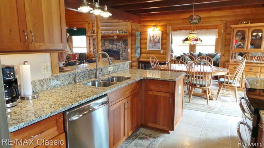 2447 North Hacker Road Howell, MI 48855 - Photo 13 of 62 Open kitchen into eating area