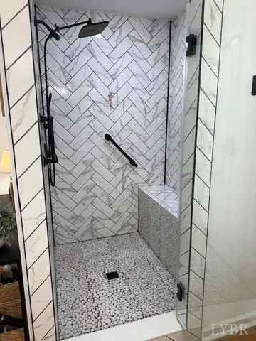 a bathroom with a sink a toilet and a window