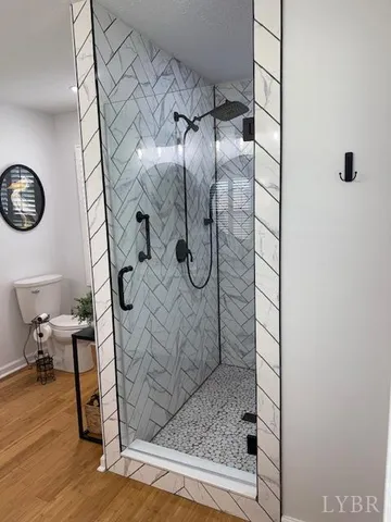 a spacious bedroom with a bed and window