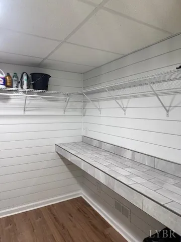 a view of a house with backyard porch and sitting area