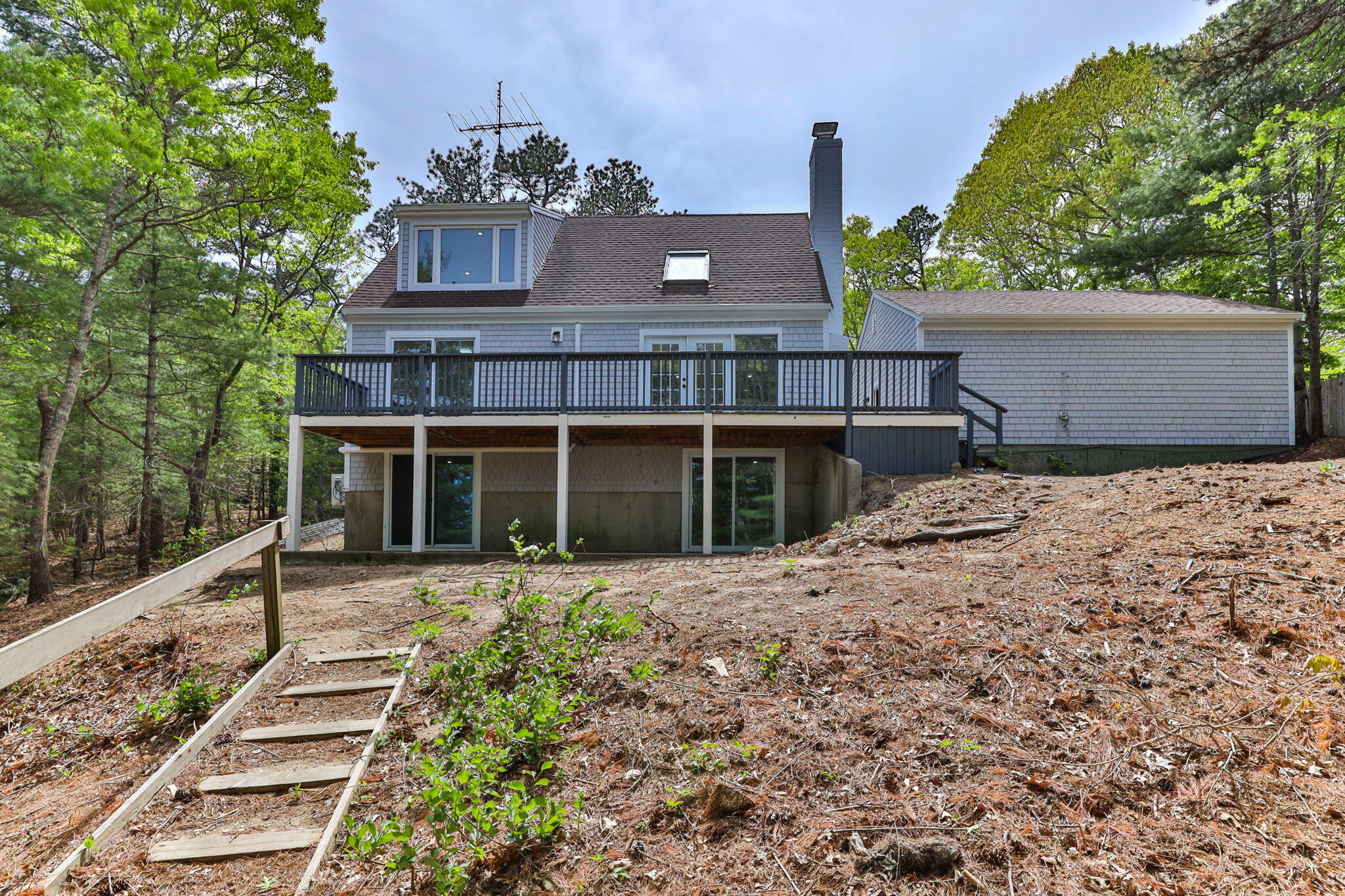 81 Sam Turner Road East Falmouth, MA 02536 - Photo 8 of 37 a front view of a house with a yard