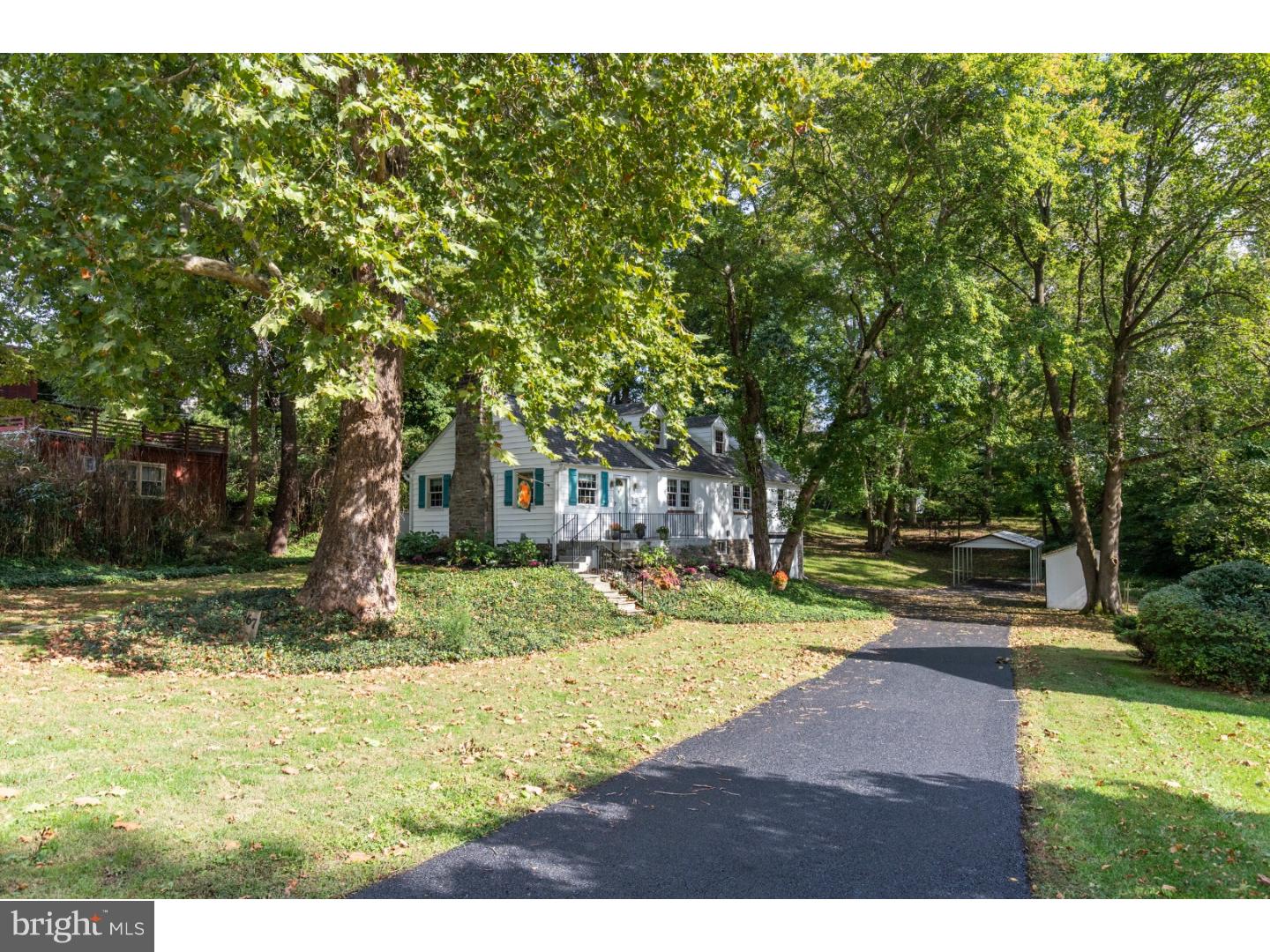 67 North Hillcrest Road Springfield, PA 19064 - Photo 4 of 23 a view of a yard with plants and trees