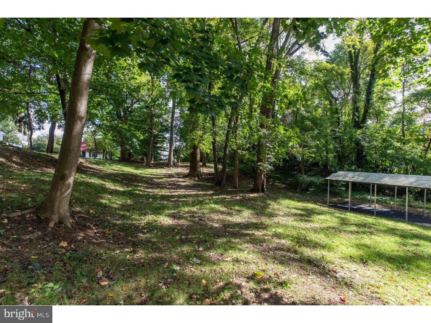 67 North Hillcrest Road Springfield, PA 19064 - Photo 6 of 23 a swimming pool with wooden fence