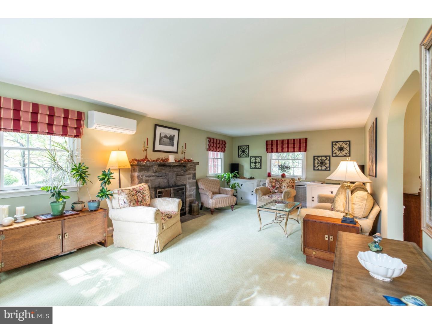 67 North Hillcrest Road Springfield, PA 19064 - Photo 8 of 23 a living room with furniture and a large window