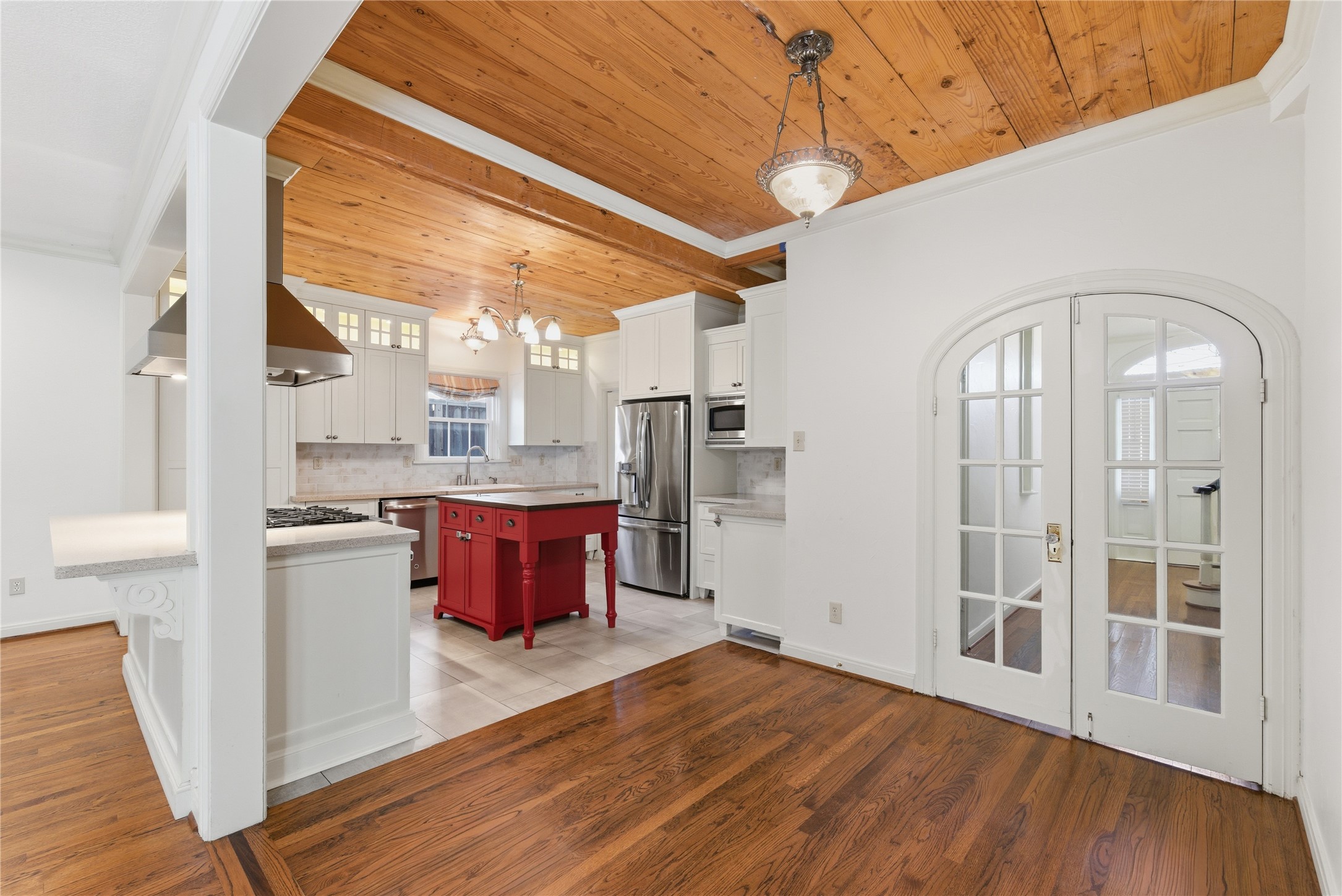 6666 Fairfield Street Houston, TX 77023 - Photo 11 of 48 a view of a kitchen with wooden floor and a kitchen